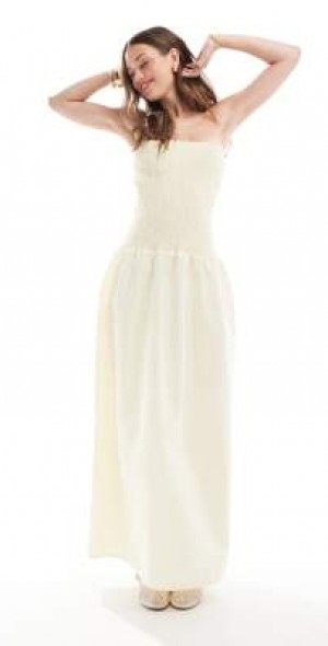 ASOS DESIGN - shirred bandeau maxi dress in pale yelow-pink