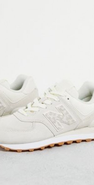 New Balance - 574 sneakers in white and animal print