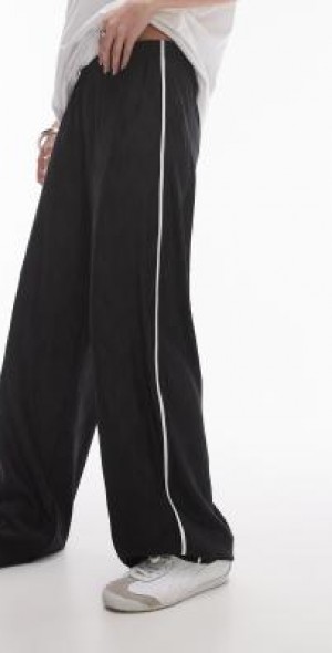 Topshop crinkle plisse side stripe pants in black and white